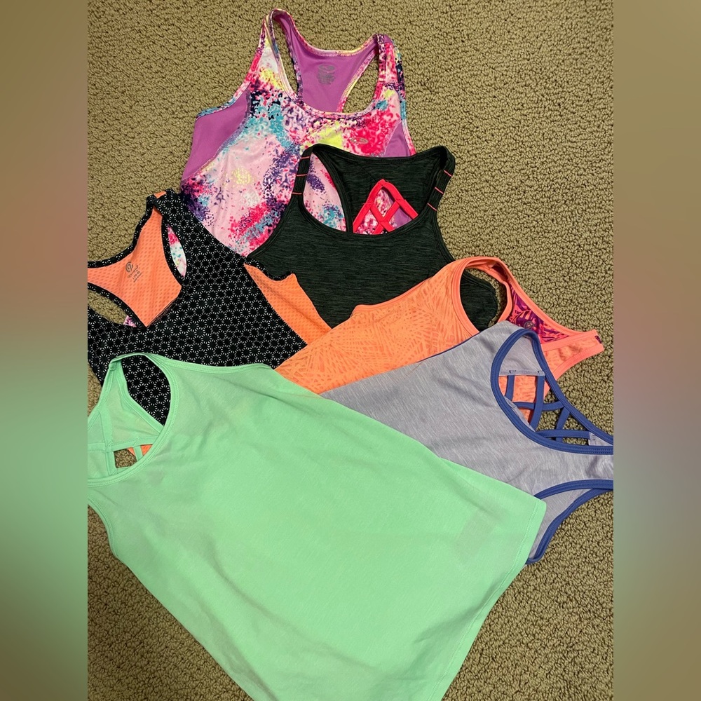 Six c9 girls racer back tank tops. All size large 10/12. Perfect condition